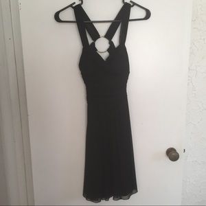 Little black dress with open back and bling!